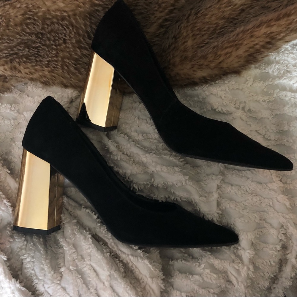 Black and chrome gold heels.